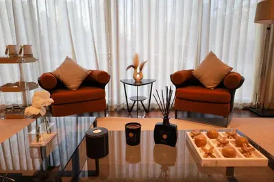a living room with two chairs and a coffee table at Luxury Yacht in Dubai Marina - Private Charter in Dubai