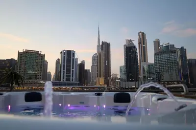 a view of a city skyline from a boat at Luxury Yacht in Dubai Marina - Private Charter in Dubai