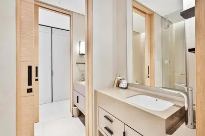 a bathroom with a sink and a mirror at Elegant 3 bed Haven in Address JBR Tower 1 in Dubai