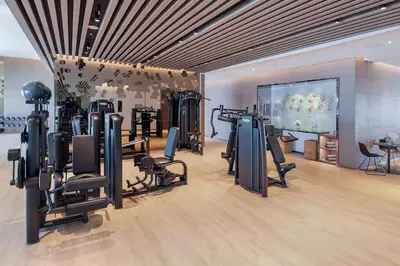 a gym with treadmills and exercise equipment in a room at Elegant 3 bed Haven in Address JBR Tower 1 in Dubai
