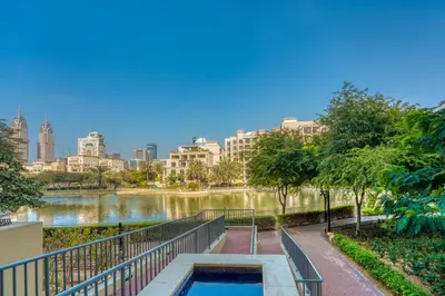 a view of a river with a city in the background at Serene Studio at The Links Canal in Dubai