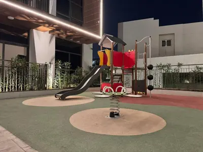 a playground in a building with a slide at Modern Studio in Barsha south with balcony in Dubai
