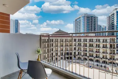 a balcony with a view of a building at Modern Studio in Barsha south with balcony in Dubai