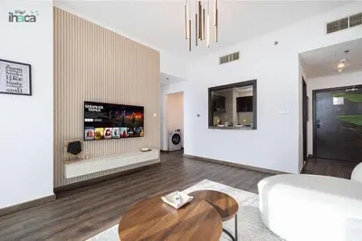 a living room with a couch and a table at 77 Floor Luxury 1Br Marina Sea View Balcony in Dubai