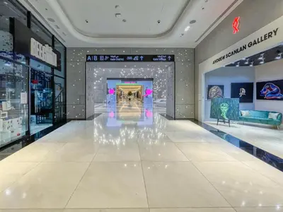 a fashion store with a large white floor at Vogue DIFC Damac Park Tower near Museum of The Future, One Bedroom Apartment with Balcony, City Skyline and Museum of The Future View, Access to all Amenities in Dubai