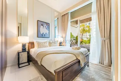 a bedroom with a bed and a large mirror at Vibrant City Living, 1Bedroom with Balcony - Vera Tower, Business Bay by Deluxe Holiday Homes in Dubai