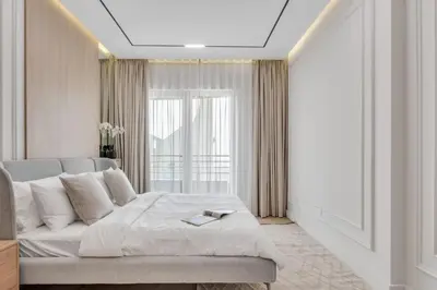 a bedroom with a bed and a large window at 2BR Retreat in the Heart of Dubai Marina by EE Holiday Homes in Dubai