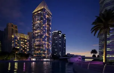 a city skyline with tall buildings at night at Stylish 1BR in Sparkle Towers Dubai Marina Escape in Dubai