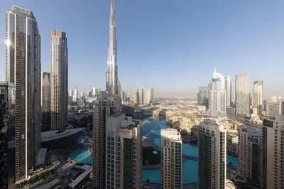 a view of a city with tall buildings at Elegant 2BR Balcony and Stunning Burj Views in Dubai