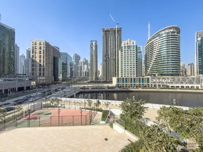 a view of a city with a river and buildings at 35 eme étage panoramique vue mer ,vue Burj Khalifa et Burj el araabe in Dubai