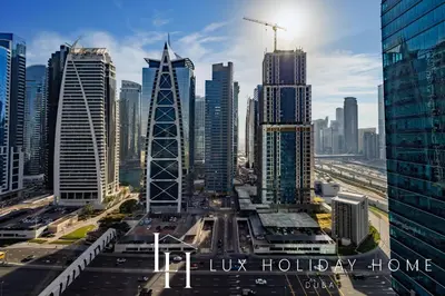 a view of a city skyline with skyscrapers at LUX The 02 Residences JLT Suite in Dubai