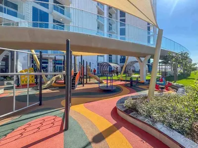 a playground in front of a building at 25 Studio Skyz By Danube, Arjan in Dubai