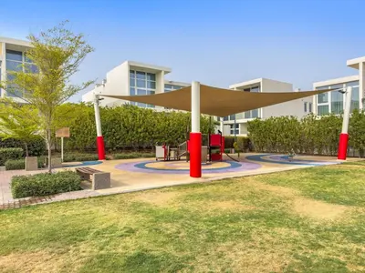 a pavilion in a park in front of a building at FIRST CLASS VILLA Zen Luxe Contemporary Haven in Dubai