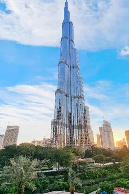 a large skyscraperraper in the middle of a city at FIRST CLASS 2BR Burj Khalifa & Fountain View in Dubai