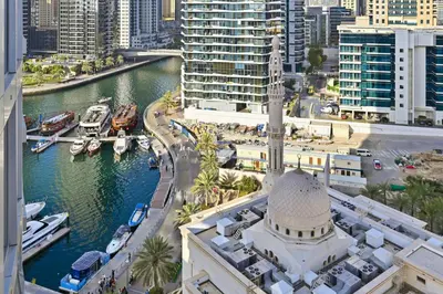 an aerial view of a city with a marina at Peaceful, Unique 1BR Experience ,Dubai Marina in Dubai