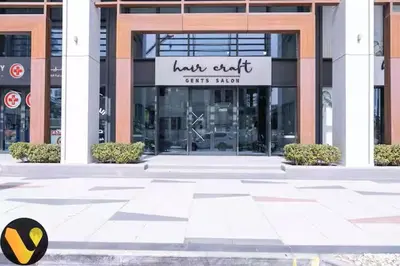 a building with a sign that reads law officefits shop at Vogue Al Wasl 1 Residences Near Zabeel Park and World Trade Centre, Two Bedroom Apartment with Balcony with City View, Access to all Amenities, Walkable to Max Fashion Metro Station in Dubai