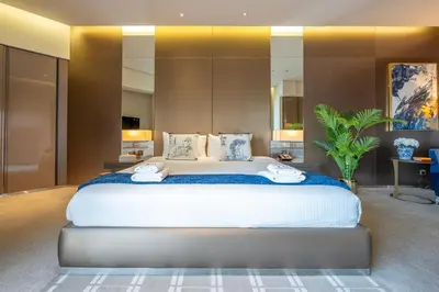a bedroom with a large bed in a room at City View Lux 1 BR in Creek Heights Upgraded by UDH in Dubai