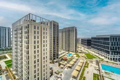 an aerial view of a city with tall buildings at Stunning 1 B R in Dubai Hills in Dubai