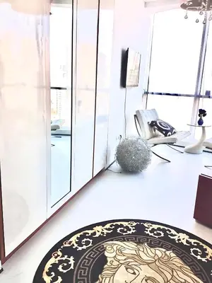 an office with a reception desk and a rug on the floor at Vip guestroom 360 view of marina private terrace with pool in Dubai