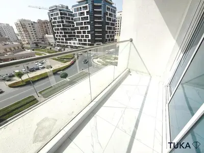 a balcony in a building with a view of a city at 1-BHK - Brand New Building - Spacious - Central in Dubai