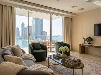 a living room with a couch and chairs and a large window at FIVE Palm | Stunning Sea-View Luxury 2BR Apartment in Dubai