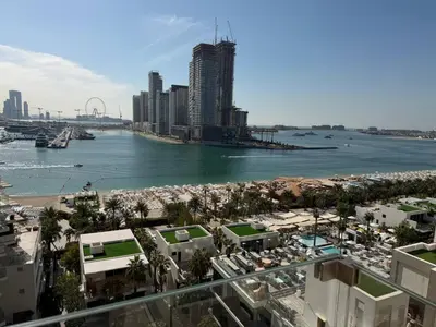 a view of a city with a river and buildings at FIVE Palm | Stunning Sea-View Luxury 2BR Apartment in Dubai
