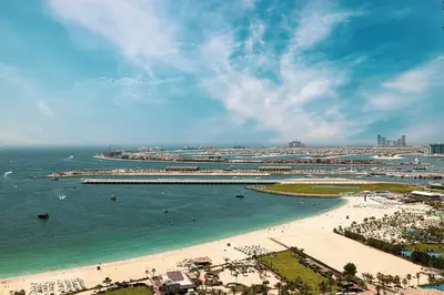 an aerial view of a beach and the ocean at FIRST CLASS 3BR Sea, Palm & Atlantis Views in Dubai
