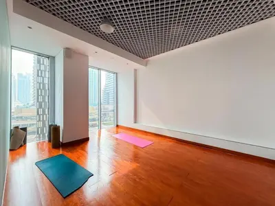 an empty room with yoga mats on the floor at Luxurious High Floor 1BDR With Full Sea View-Cayan48 in Dubai