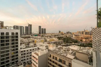 a view of a city skyline with tall buildings at FIRST CLASS Studio Charming Cozy Comfort in Dubai