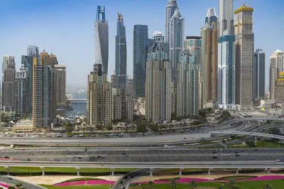 a view of a large city with a highway at Modern Comfort - Convenient - Prime JLT Living in Dubai