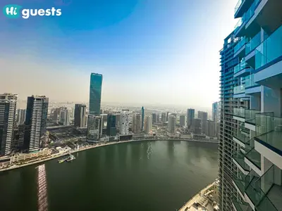 a view of a large body of water in a city at HiGuests - Peninsula Luxury 1 BR with Stunning Water Views in Dubai