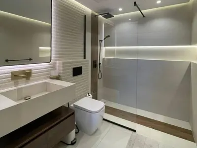 a bathroom with a shower and a toilet and a sink at Luxury 2 Bedroom Shemara Tower Dubai Marina in Dubai