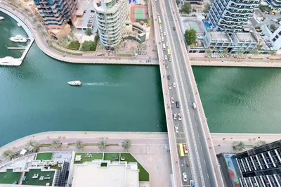 an aerial view of a city with a river and buildings at Prime Located 3B with full Marina Views, Near Beach & Marina Mall in Dubai