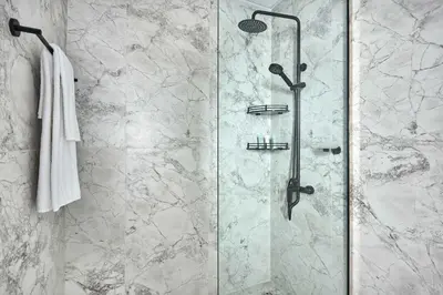a bathroom with a shower with a glass door at Frank Porter - Opalz by Danube in Dubai