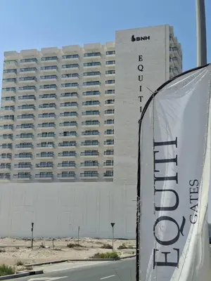 a large building with the santander hotel written on it at Equity Gate 217 in Dubai