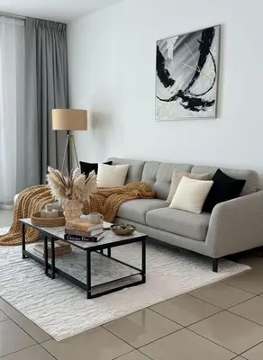 a living room with a couch and a coffee table at Palm Sea View - Dubai Marina- 2 Bedrooms in Dubai