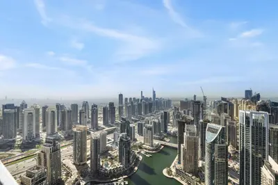an aerial view of a city with tall buildings at Deluxe Marina Gate Suite with Sea and Ain Dubai View in Dubai
