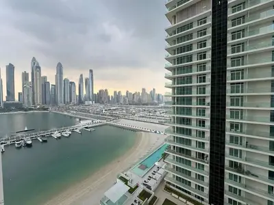 a view of a city with a harbor and buildings at Breathtaking 1 BDR with Palm & Marina View-25 in Dubai