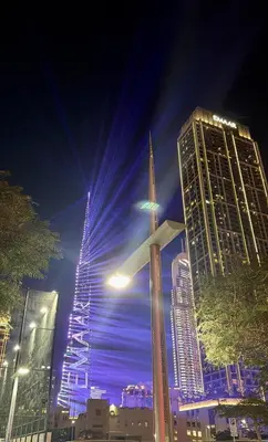 a view of a city at night with buildings at Luxury Executive 1BR with Full Burj Khalifa View- Downtown in Dubai
