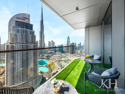 a room with a view of a city at keylid-Stunning-Luxury 2BR connected to Dubai Mall in Dubai