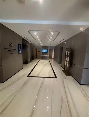 an empty bowling alley in a large building at Sea View Spacious Apartment in JBR in Dubai