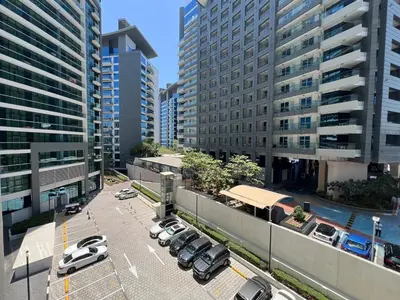 an aerial view of a parking lot in a city at Beach access, next to shopping mall in Dubai
