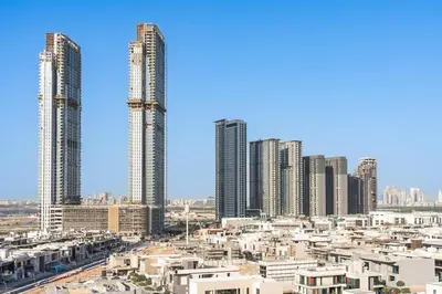 a view of a city with tall buildings at Elegant 1BR Near Downtown Azizi Riviera 3 in Dubai