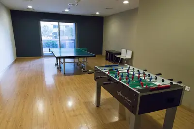 a ping pong table in a room with a ping pong ball at Princess Tower Dubai Marina private Spa amazing view in Dubai