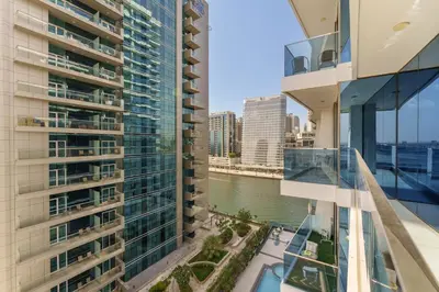 a view from the balcony of a building at Maison Privee - Modern Business Bay Retreat with Dubai Canal Views in Dubai