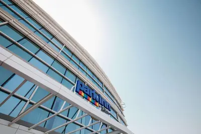 a sign on the side of a building at Park Inn by Radisson Dubai Motor City in Dubai