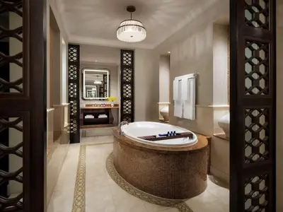 a bathroom with a large tub in the middle at Atlantis, The Palm in Dubai
