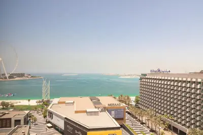 a view of the beach and a hotel and the ocean at Maison Privee - Premium Apt in the Heart of JBR Beach, Dubai in Dubai