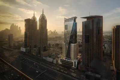 a group of tall buildings in a city at Staybridge Suites Dubai Internet City by IHG in Dubai