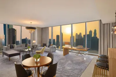 a living room with a view of a city at The St. Regis Downtown Dubai in Dubai